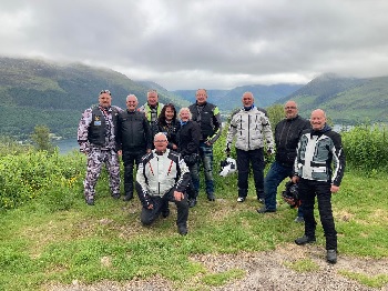 Group of Riders with Loch Duich in the background