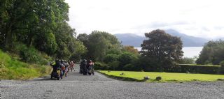 Harley-Davidsons leaving hotel car park