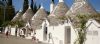 The Trullis at Alberobello – round white houses with conical shaped roofs